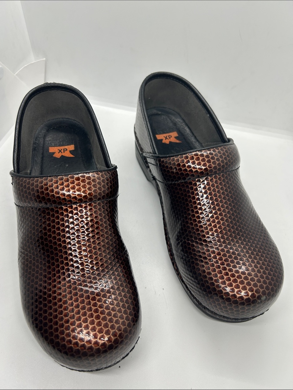 Dansko Brown Metallic Hex-Pattern Clogs